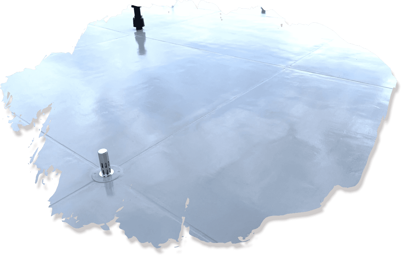 防水加工が施された滑らかな表面の屋上。排水口が設置されている